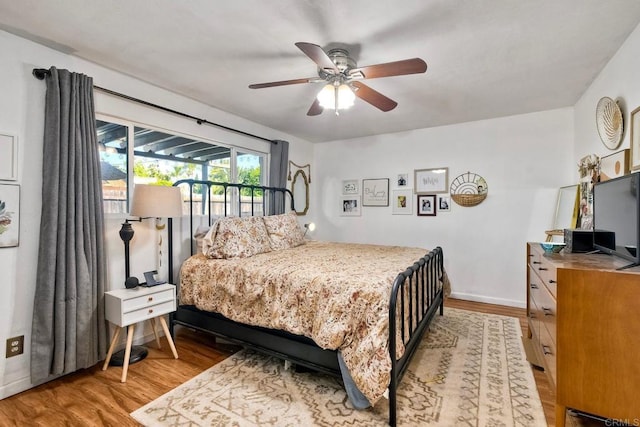 1807 Calle Sinaloa, Vista, CA 92084 - bedroom featuring wood finished floors, baseboards, access to outside, and ceiling fan