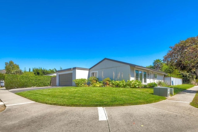 1807 Calle Sinaloa, Vista, CA 92084 - view of front facade with a front lawn and an attached garage