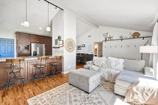 1807 Calle Sinaloa, Vista, CA 92084 - living room with light wood-type flooring, high vaulted ceiling, and recessed lighting