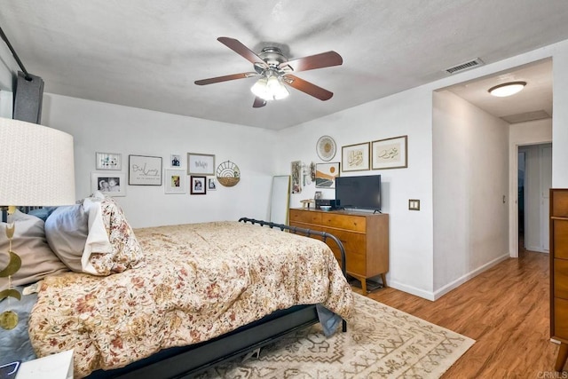 1807 Calle Sinaloa, Vista, CA 92084 - bedroom featuring light wood-style flooring, baseboards, and a ceiling fan