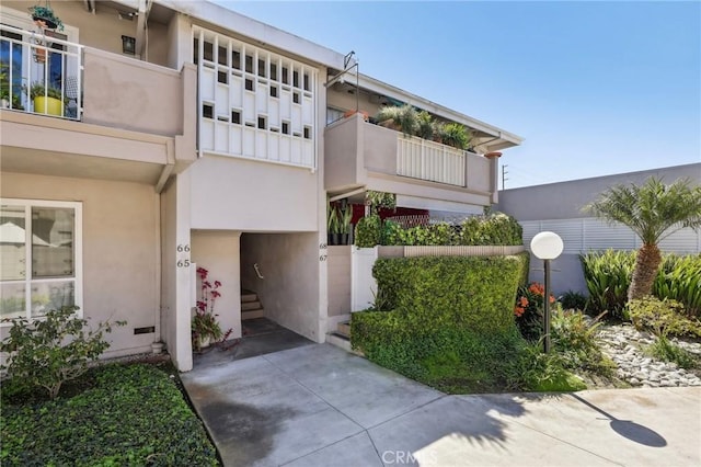 3110 Merrill Dr Unit 67, Torrance, CA 90503 - doorway to property with stucco siding