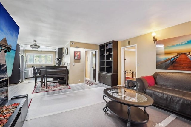 3110 Merrill Dr Unit 67, Torrance, CA 90503 - living area featuring ceiling fan, wood finished floors, and baseboards