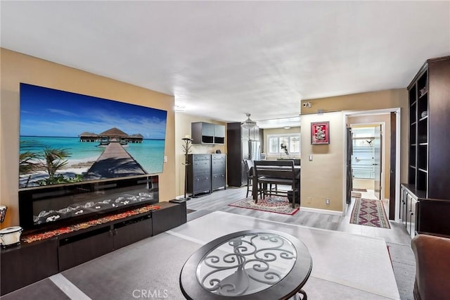 3110 Merrill Dr Unit 67, Torrance, CA 90503 - living room with light wood-style floors and baseboards