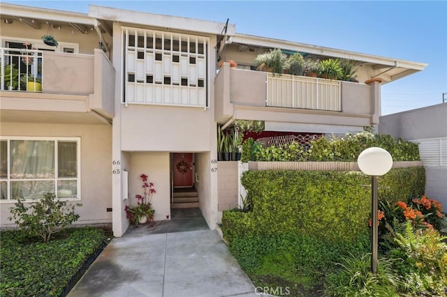3110 Merrill Dr Unit 67, Torrance, CA 90503 - view of front facade featuring stucco siding