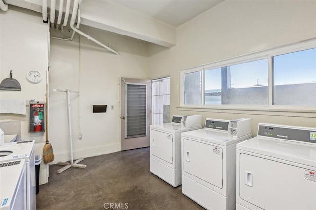 3110 Merrill Dr Unit 67, Torrance, CA 90503 - laundry room featuring separate washer and dryer and baseboards
