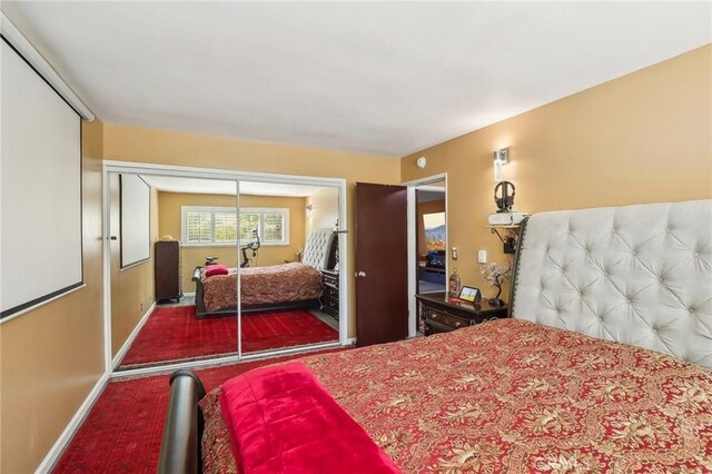 3110 Merrill Dr Unit 67, Torrance, CA 90503 - bedroom with carpet flooring, a closet, and baseboards