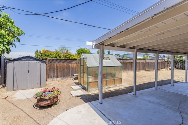 2065 Medina Ave, Simi Valley, CA 93063 - fenced backyard featuring a patio area and an exterior structure
