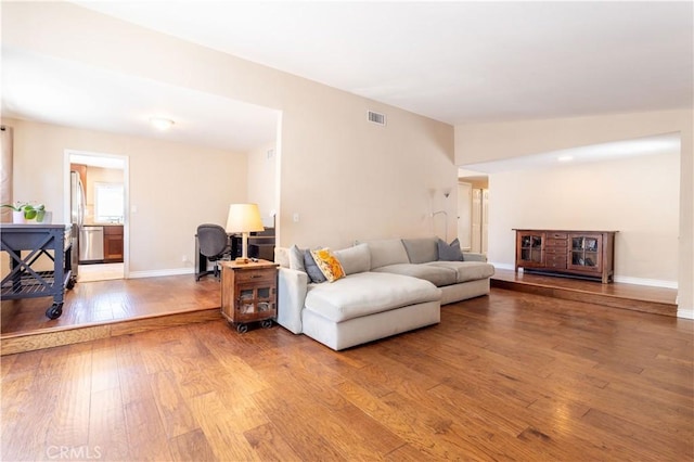 2065 Medina Ave, Simi Valley, CA 93063 - living area with hardwood / wood-style floors and baseboards