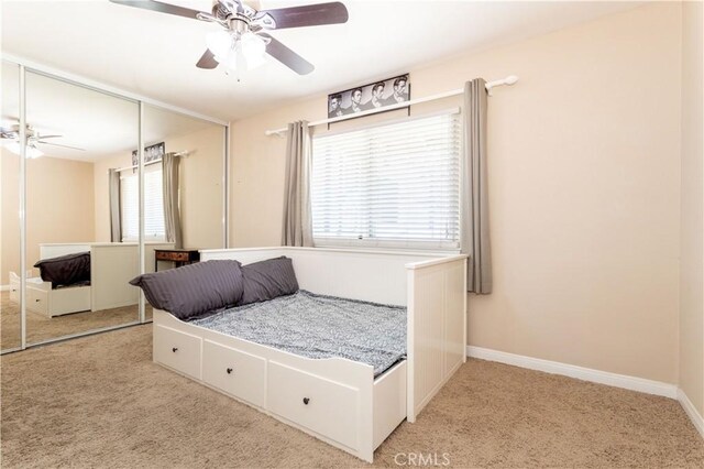 2065 Medina Ave, Simi Valley, CA 93063 - bedroom with light colored carpet, a closet, and baseboards