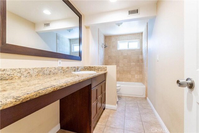 2065 Medina Ave, Simi Valley, CA 93063 - bathroom featuring toilet, vanity, tile patterned flooring, baseboards, and  shower combination