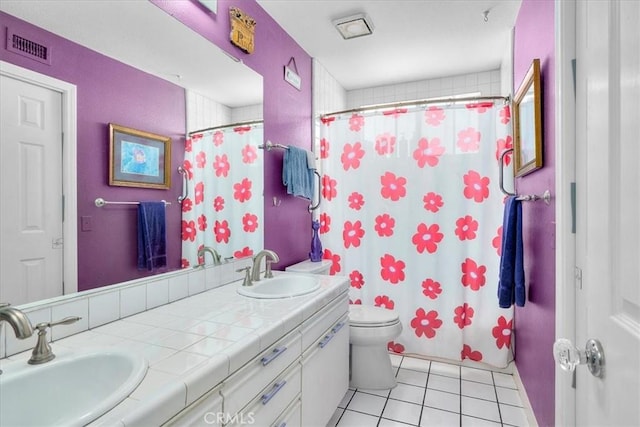 377 Roycroft Ave, Long Beach, CA 90814 - full bathroom featuring tile patterned flooring, toilet, double vanity, and a shower with shower curtain