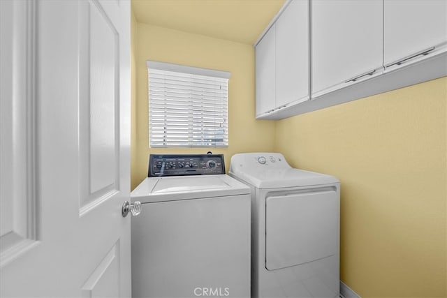 377 Roycroft Ave, Long Beach, CA 90814 - laundry area featuring cabinet space and washer and dryer