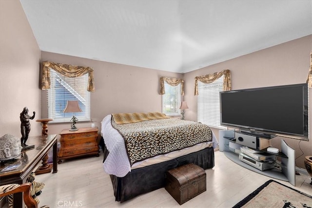377 Roycroft Ave, Long Beach, CA 90814 - bedroom featuring light wood finished floors and vaulted ceiling