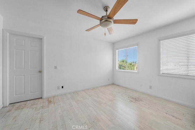 377 Roycroft Ave, Long Beach, CA 90814 - unfurnished room with ceiling fan, wood finished floors, and baseboards