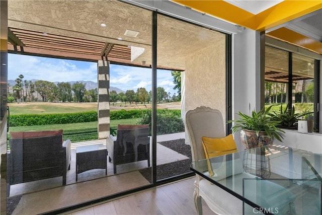 171 Yale Dr, Rancho Mirage, CA 92270 - doorway featuring wood finished floors and golf course view