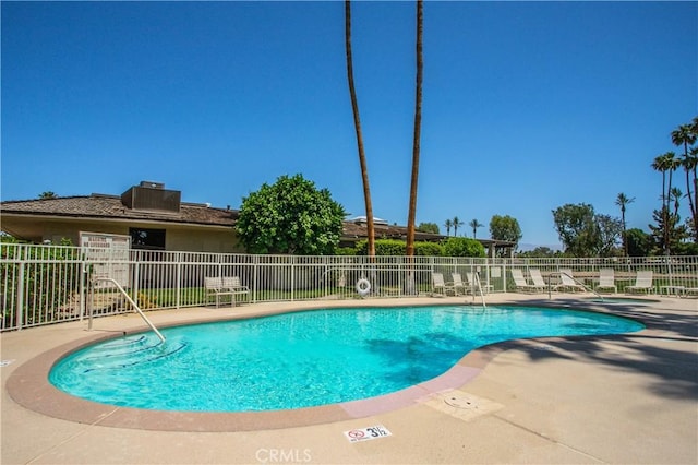 171 Yale Dr, Rancho Mirage, CA 92270 - community pool featuring a patio area and central air condition unit