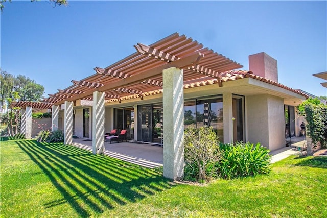 171 Yale Dr, Rancho Mirage, CA 92270 - rear view of property featuring stucco siding, a pergola, a chimney, a yard, and a tile roof
