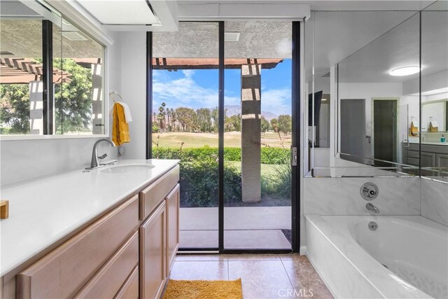 171 Yale Dr, Rancho Mirage, CA 92270 - bathroom featuring a bath, vanity, and tile patterned floors