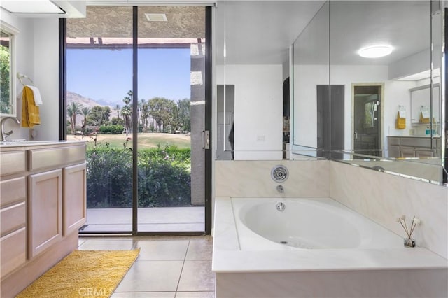 171 Yale Dr, Rancho Mirage, CA 92270 - bathroom with a garden tub, tile patterned floors, and vanity