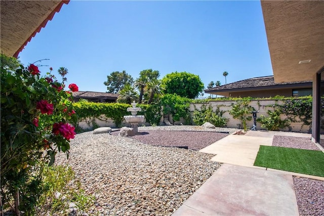 171 Yale Dr, Rancho Mirage, CA 92270 - fenced backyard with a patio area
