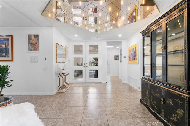 171 Yale Dr, Rancho Mirage, CA 92270 - tiled foyer with baseboards and french doors