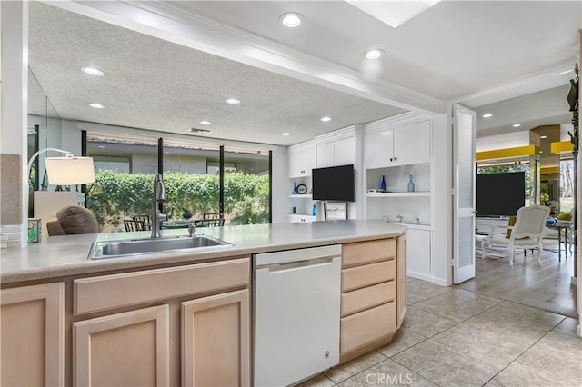 171 Yale Dr, Rancho Mirage, CA 92270 - kitchen featuring white dishwasher, a sink, light tile patterned floors, open shelves, and light countertops