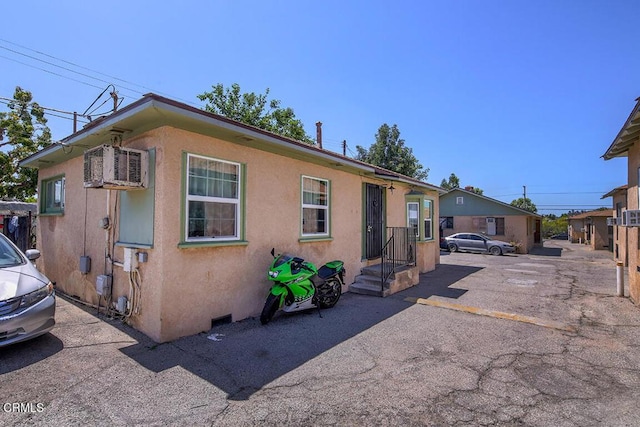 12528 Bradley Ave, Los Angeles, CA 91342 - bungalow-style house with stucco siding and uncovered parking