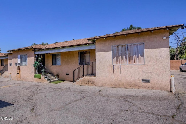 12528 Bradley Ave, Los Angeles, CA 91342 - bungalow-style house with crawl space and stucco siding