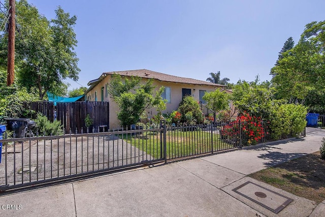 12528 Bradley Ave, Los Angeles, CA 91342 - view of front of house featuring stucco siding and a gate