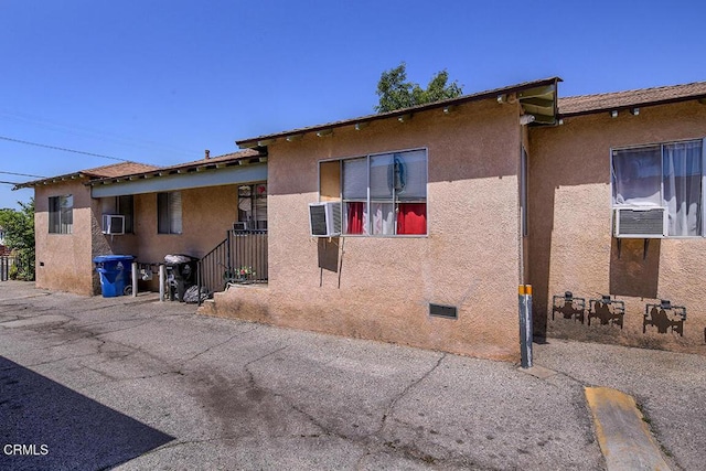 12528 Bradley Ave, Los Angeles, CA 91342 - rear view of house with stucco siding