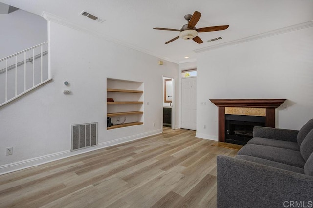 8375 Gold Coast Dr Unit 4, San Diego, CA 92126 - living room featuring ceiling fan, wood finished floors, crown molding, baseboards, and stairs