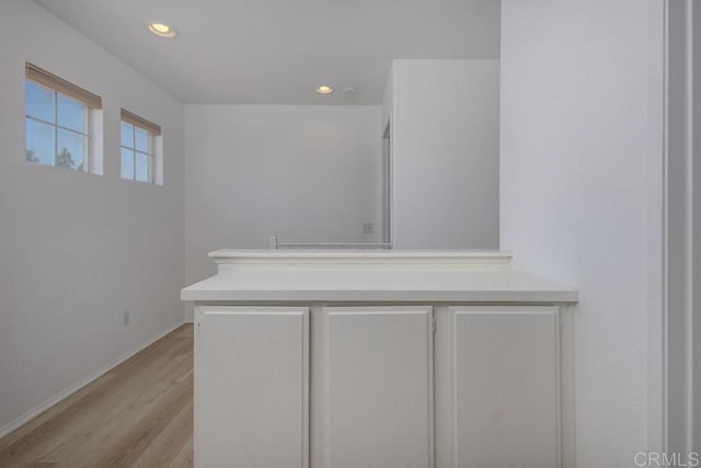 8375 Gold Coast Dr Unit 4, San Diego, CA 92126 - detailed view of wood finished floors, recessed lighting, and baseboards