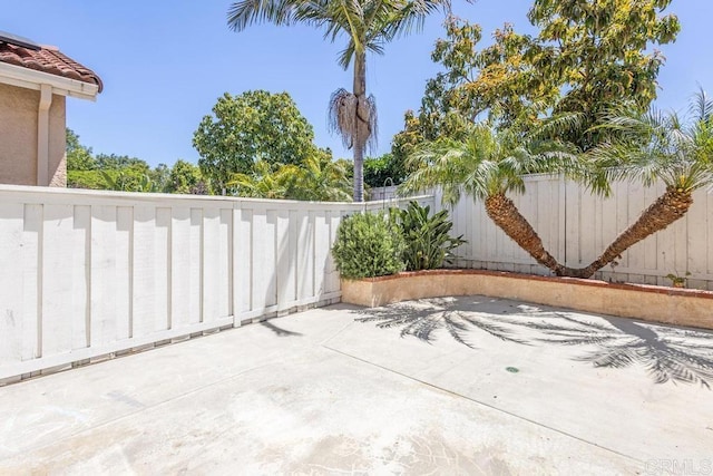 8375 Gold Coast Dr Unit 4, San Diego, CA 92126 - fenced backyard with a patio