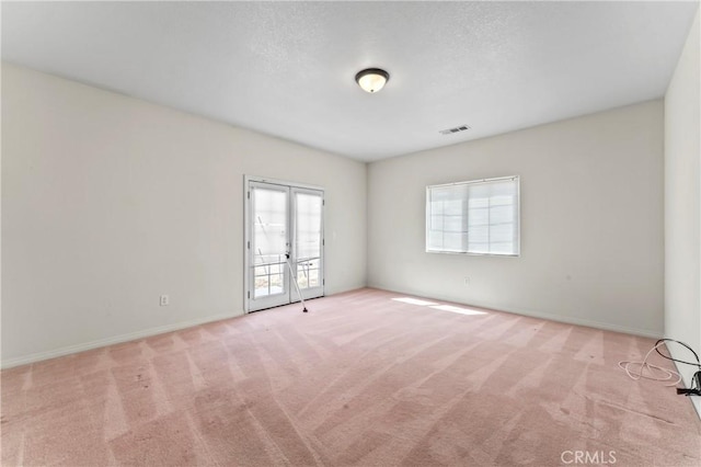 7841 Fernwood Ave, California City, CA 93505 - carpeted spare room with french doors and baseboards