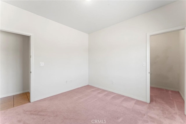 7841 Fernwood Ave, California City, CA 93505 - spare room with light colored carpet and baseboards