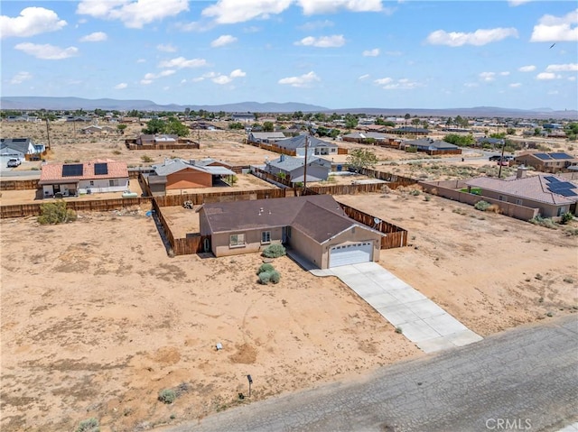7841 Fernwood Ave, California City, CA 93505 - aerial view of residential area featuring a mountainous background