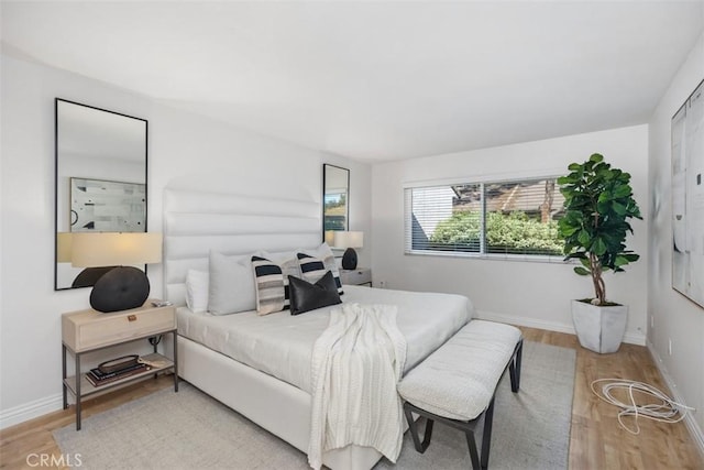 4 Dogwood N, Irvine, CA 92612 - bedroom with light wood-type flooring and baseboards