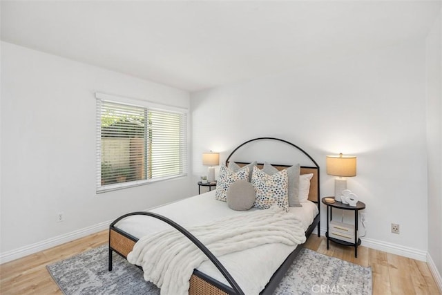4 Dogwood N, Irvine, CA 92612 - bedroom with wood finished floors and baseboards