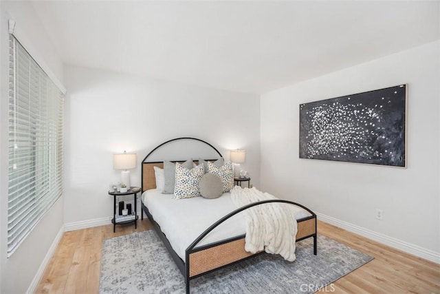 4 Dogwood N, Irvine, CA 92612 - bedroom featuring wood finished floors and baseboards