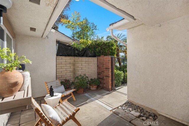 4 Dogwood N, Irvine, CA 92612 - view of patio featuring a gate