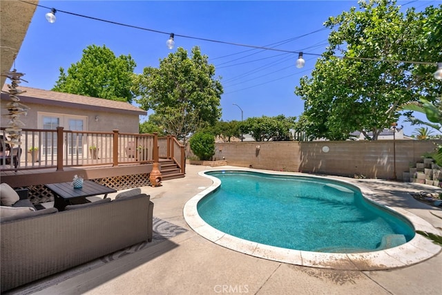 2619 S Castle Harbour Ave, Ontario, CA 91761 - view of pool featuring a wooden deck, a fenced backyard, and a patio