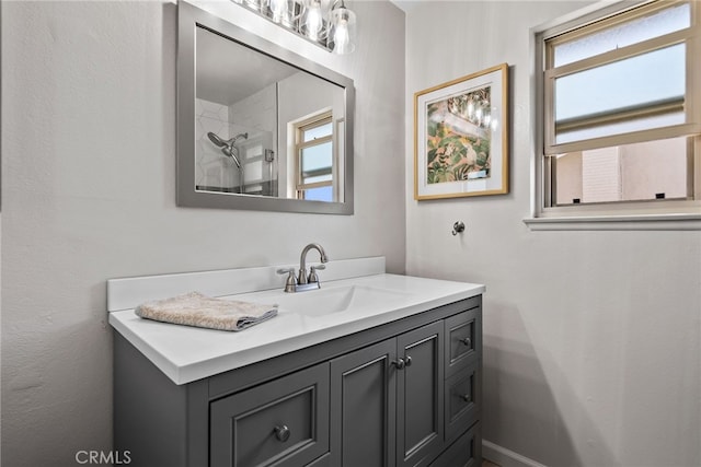 2619 S Castle Harbour Ave, Ontario, CA 91761 - bathroom featuring healthy amount of natural light, vanity, and a shower