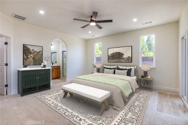 6210 Himmel St, Paradise, CA 95969 - bedroom featuring arched walkways, recessed lighting, ensuite bathroom, baseboards, and ceiling fan