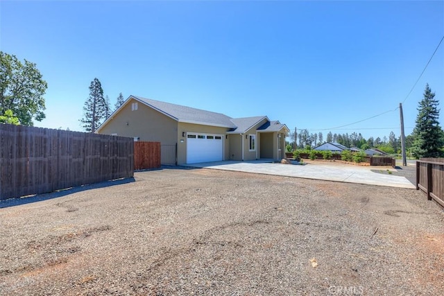 6210 Himmel St, Paradise, CA 95969 - view of front of home featuring concrete driveway and a garage