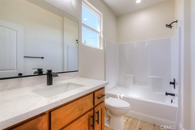 6210 Himmel St, Paradise, CA 95969 - full bath featuring vanity, toilet, wood finished floors, and bathing tub / shower combination