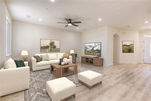 6210 Himmel St, Paradise, CA 95969 - living room with recessed lighting, ceiling fan, arched walkways, light wood-type flooring, and baseboards