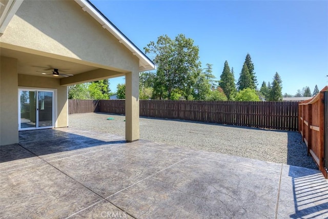 6210 Himmel St, Paradise, CA 95969 - fenced backyard featuring a ceiling fan and a patio area