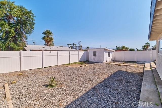 68600 E St, Cathedral City, CA 92234 - fenced backyard with an outdoor structure