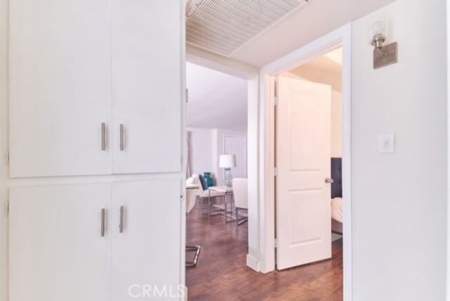 68600 E St, Cathedral City, CA 92234 - hallway featuring dark wood-style floors