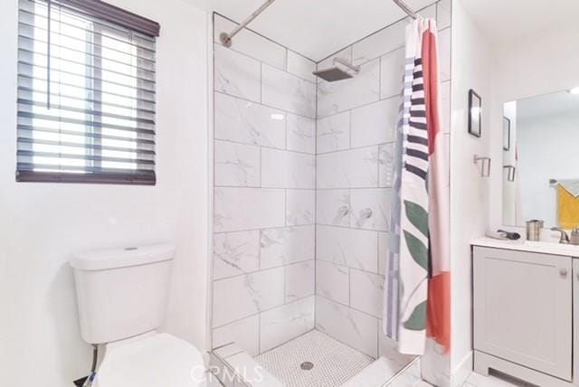 68600 E St, Cathedral City, CA 92234 - bathroom with vanity, toilet, and a shower stall